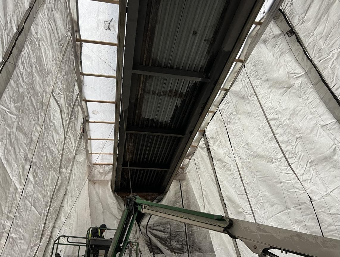 Bridge containment interior during painting