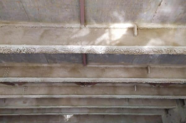 Fireproof coating on steel ceiling structure