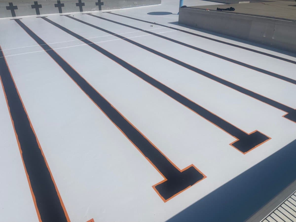 Pool lane markings painted on large commercial pool