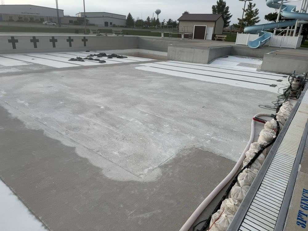Commercial pool surface preparation before painting