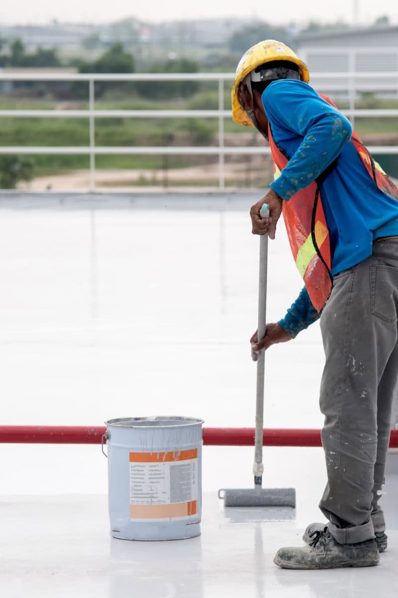 Commercial flat roof coating application by Markley's Precision Company