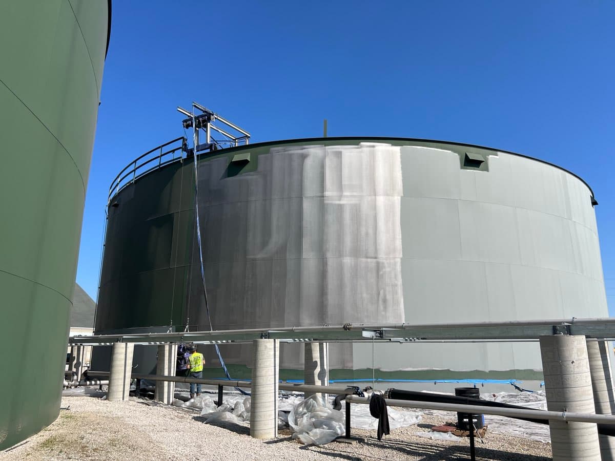 Large storage tank sandblasting in progress by Markley's Precision