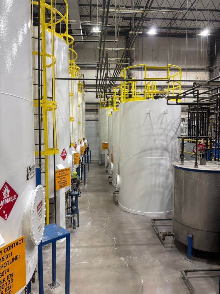 Indoor industrial solvent tanks painted by Markley's Precision in West Virginia