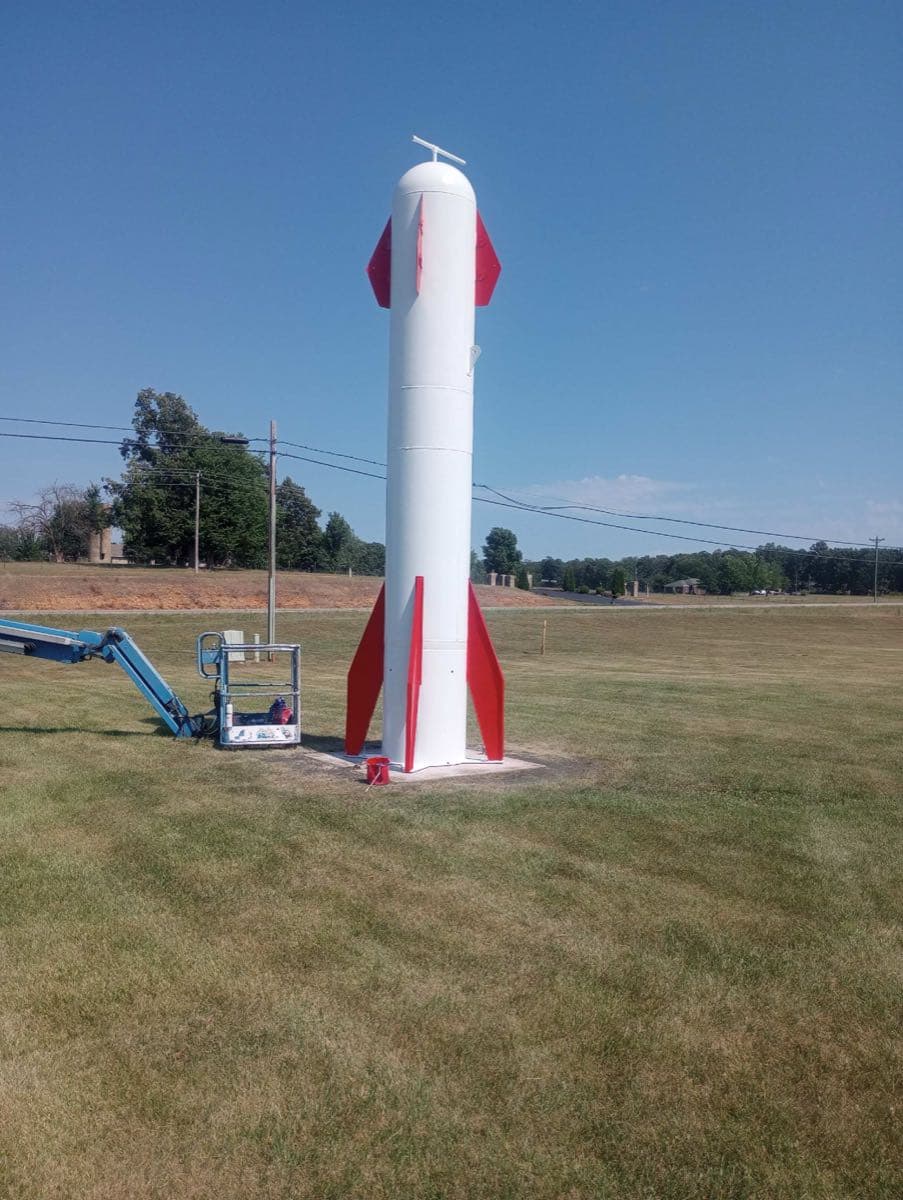 Unique rocket-shaped propane tank painted red and white by MPC