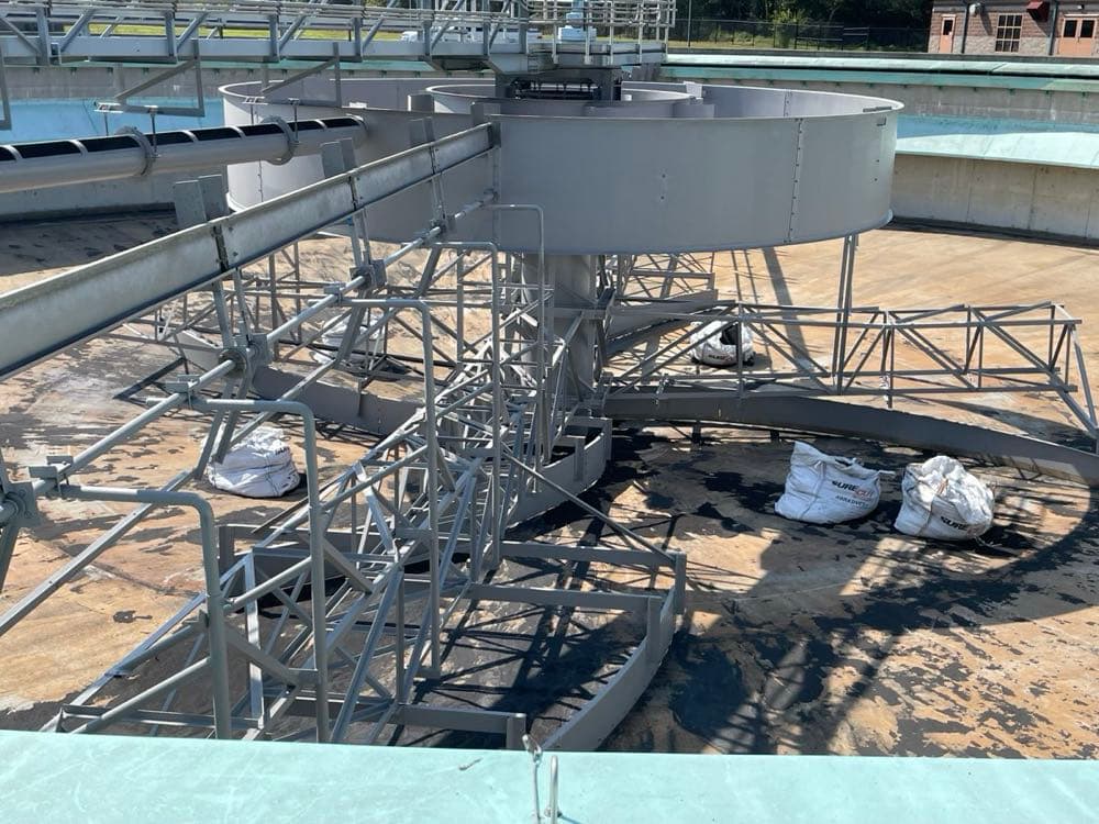 Interior of water tank during lining application